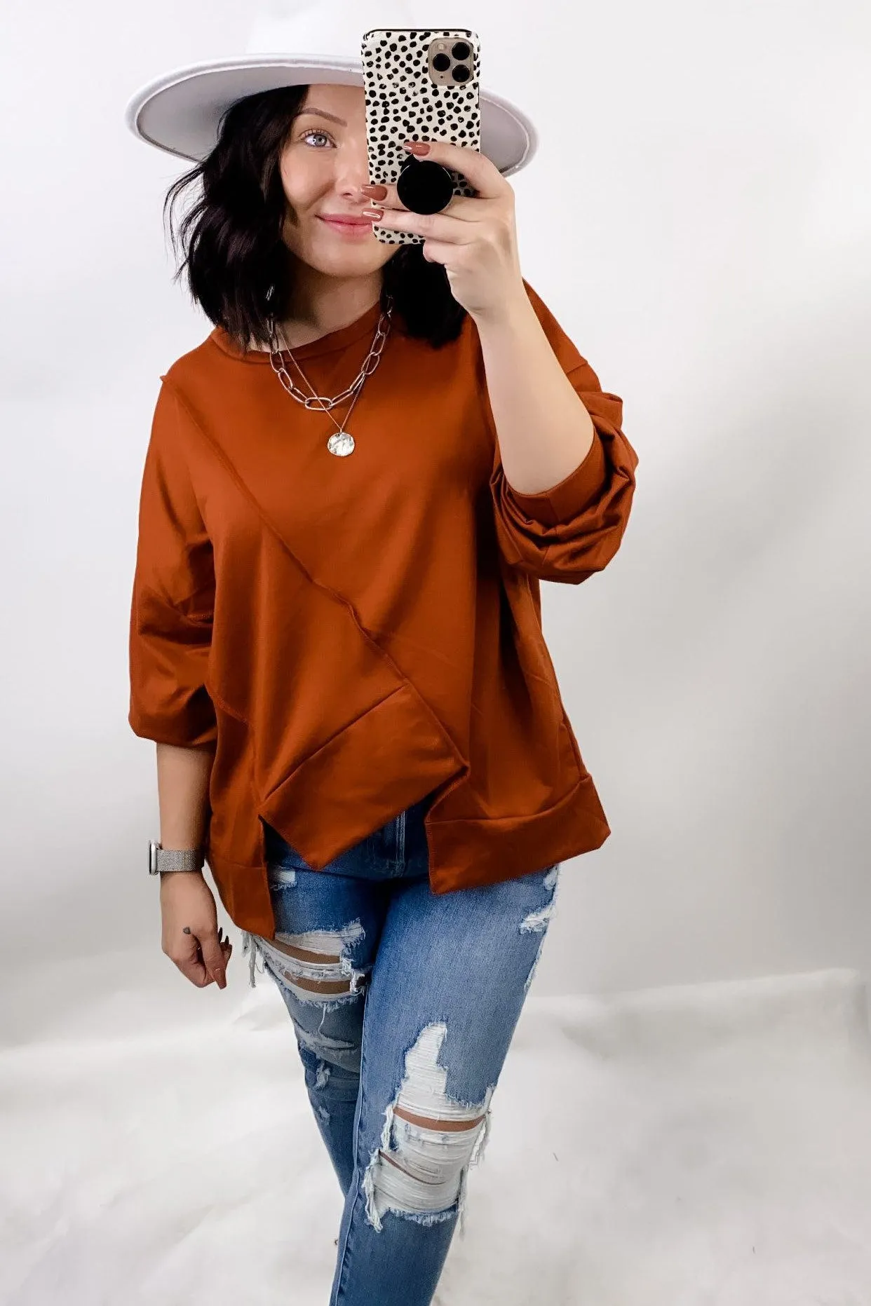 Making The Cut- Rust Long Sleeve w/ Cutout Hemline