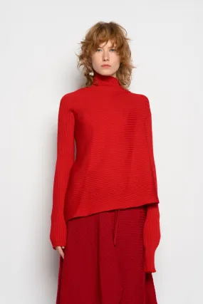 RED DRAPED JUMPER IN MERINO KNIT